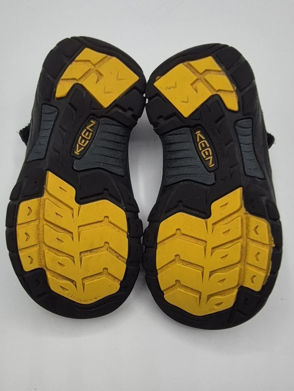Keen Kids Closed-Toe Sandals in Navy with Yellow Accents
